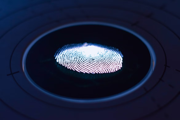 A dimly fingerprint on a circular glass-like panel